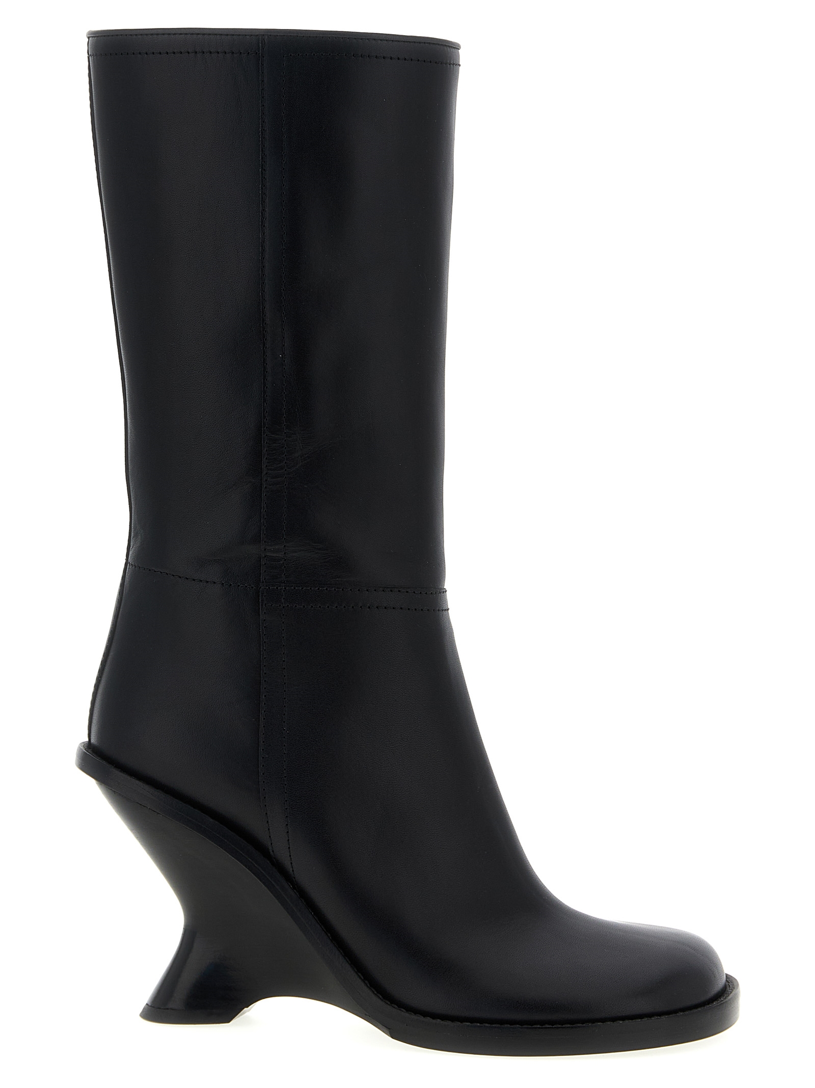 Curved wedge heel boots