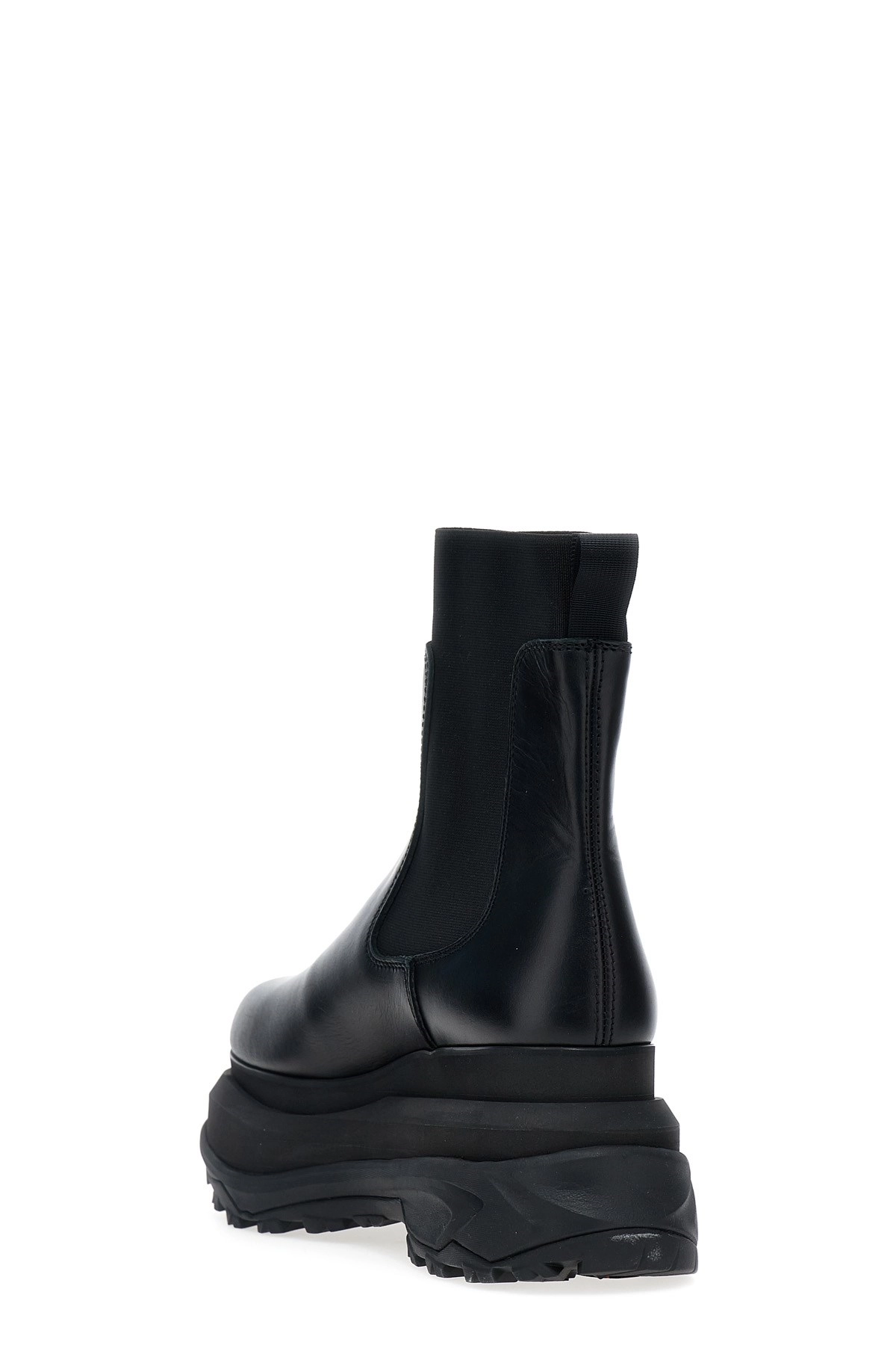 Sacai Chelsea leather ankle boots available on julian
